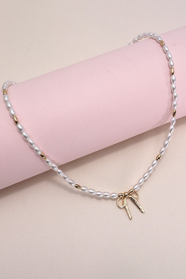 Bow Ribbon Pearl Necklace